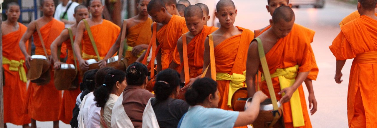 Monks collecting sticky rice at dawn, Luang Prabang